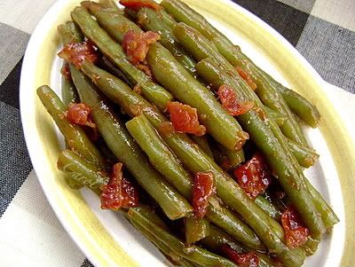 /></span></span><br/> <br/> I love finding new recipes using fresh vegetables.....it's always nice to have a new side dish on the table. When I ran across this recipe, I knew I had to try it.  What a SUPER summer side dish this is.<br/> <br/> The original recipe calls for canned green beans but I use steamed fresh green beans-about 1 1/2 lb. The sauce coats them nicely........OHHHH is it good-it's really different. I use Kraft Original Barbecue Sauce but feel free to use your favorite brand and flavor of barbecue sauce.<br/> <br/> The crumbled bacon adds a nice finishing touch to the dish (yes, that's bacon in the photo-it kind of looks like tomatoes, doesn't it?).<br/> <br/></div> <div>This recipe has gone to the top of my favorites folder for side dishes......it's a winner.</div> <div> </div> <div><br/> Carol<br/> <br/> <span style=